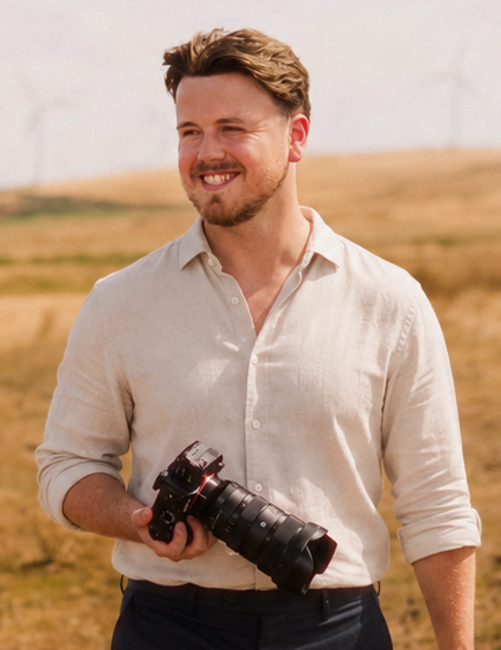 Cam holding a camera in a field
