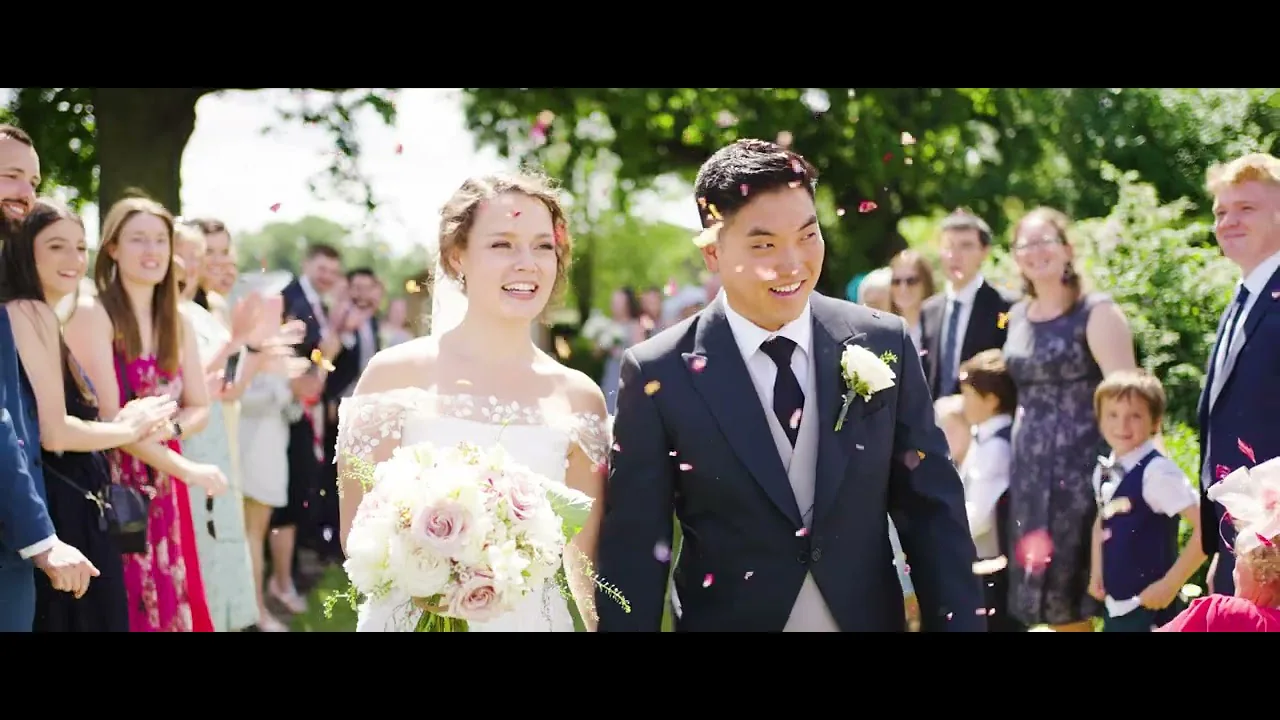 Still from Becky & Tae’s wedding highlight at Micklefield Hall