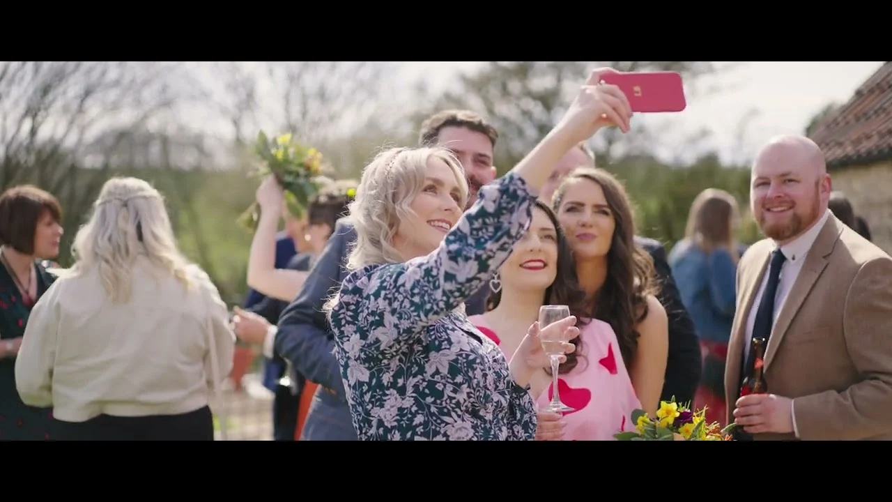 Still from Graeme & Coz’s wedding highlight at The Kingscote Barn