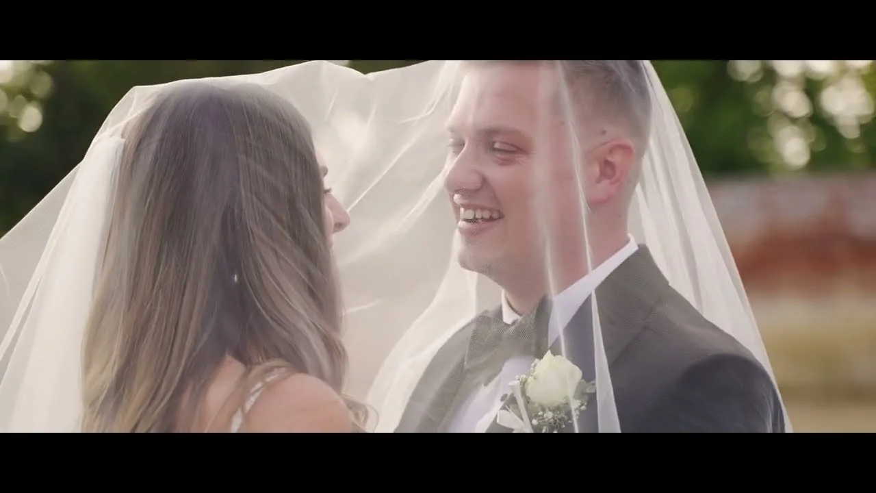 Still from Brittany & George’s wedding highlight at Worstead Estate