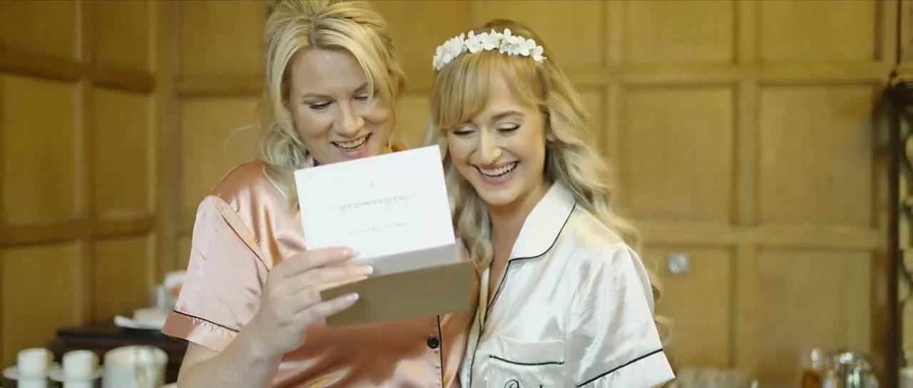 Still from Lucy & Christian’s wedding highlight at Dumbleton Hall