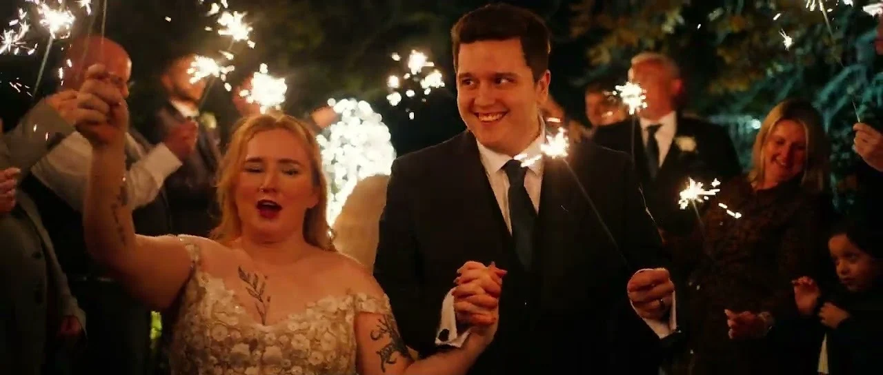 Still from Georgia & James’s wedding highlight at Bassmead Manor Barns