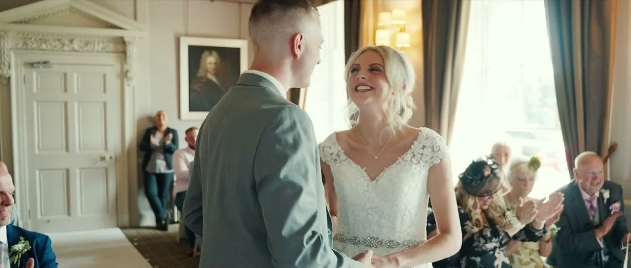Still from Brittany & Callum’s wedding highlight at Wood Hall Hotel