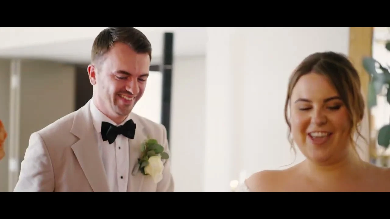 Still from Kiana & Ryan’s wedding highlight at Houchins
