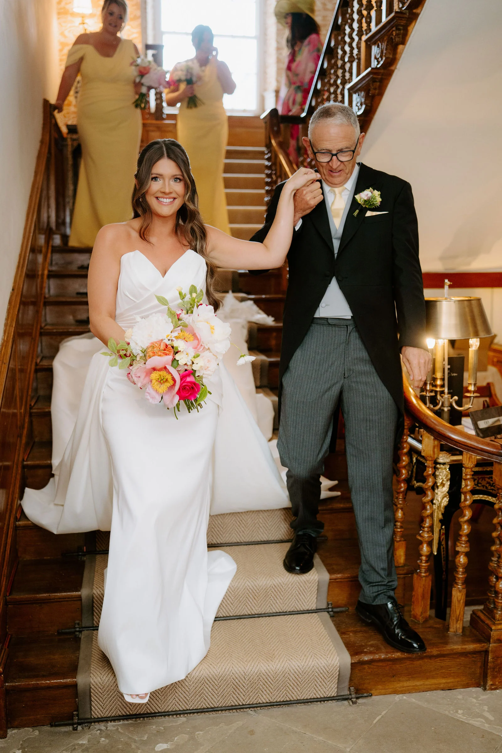 Romantic wedding portrait by the historic Georgian stone walls at Gileston Manor