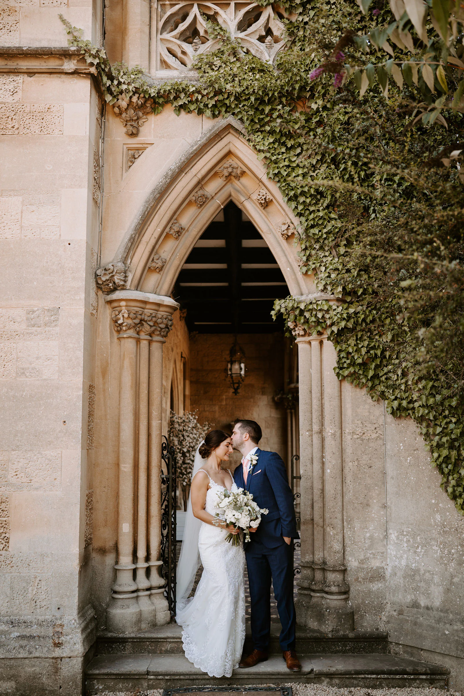 Romantic couple portrait beside the lake at Manor by the Lake