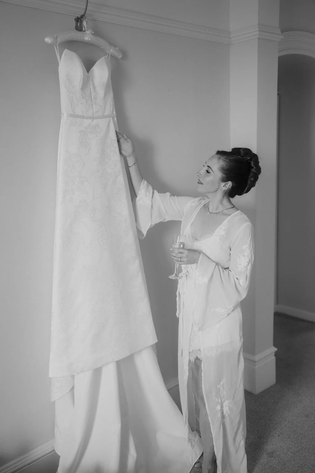 Louisa | Morning Bridal Prep at New House Country Hotel Bride in her lace wedding gown standing in the elegant light of the manor bedroom at New House Country Hotel