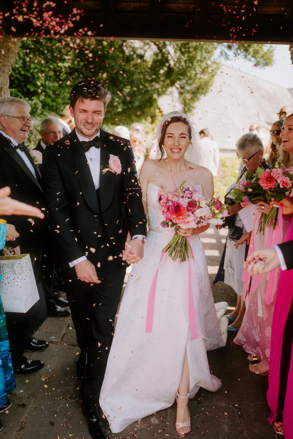 Louisa and Chris celebrating their marriage ceremony at New House Country Hotel