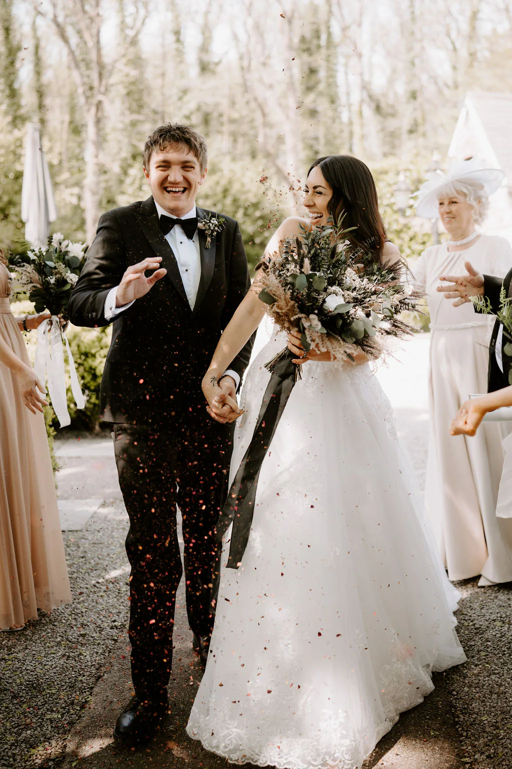 Amy and Dan romantic wedding portrait outside the 15th-century Old Hall at Pencoed House Estate