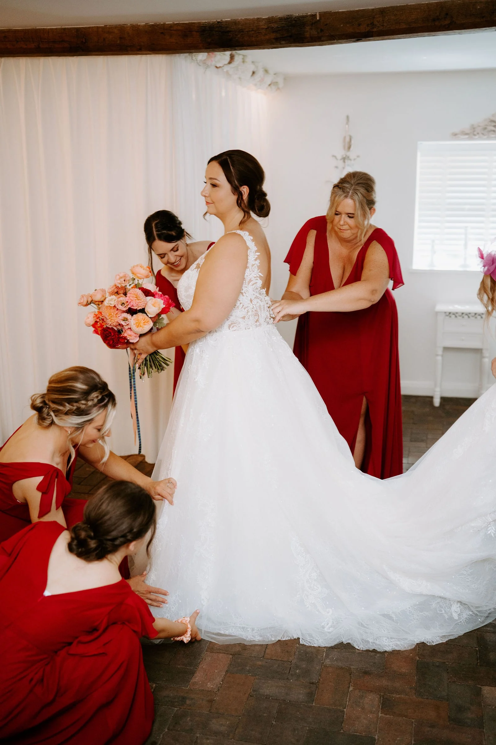 Lauren getting ready with her bridesmaids at Alcumlow Wedding Barn
