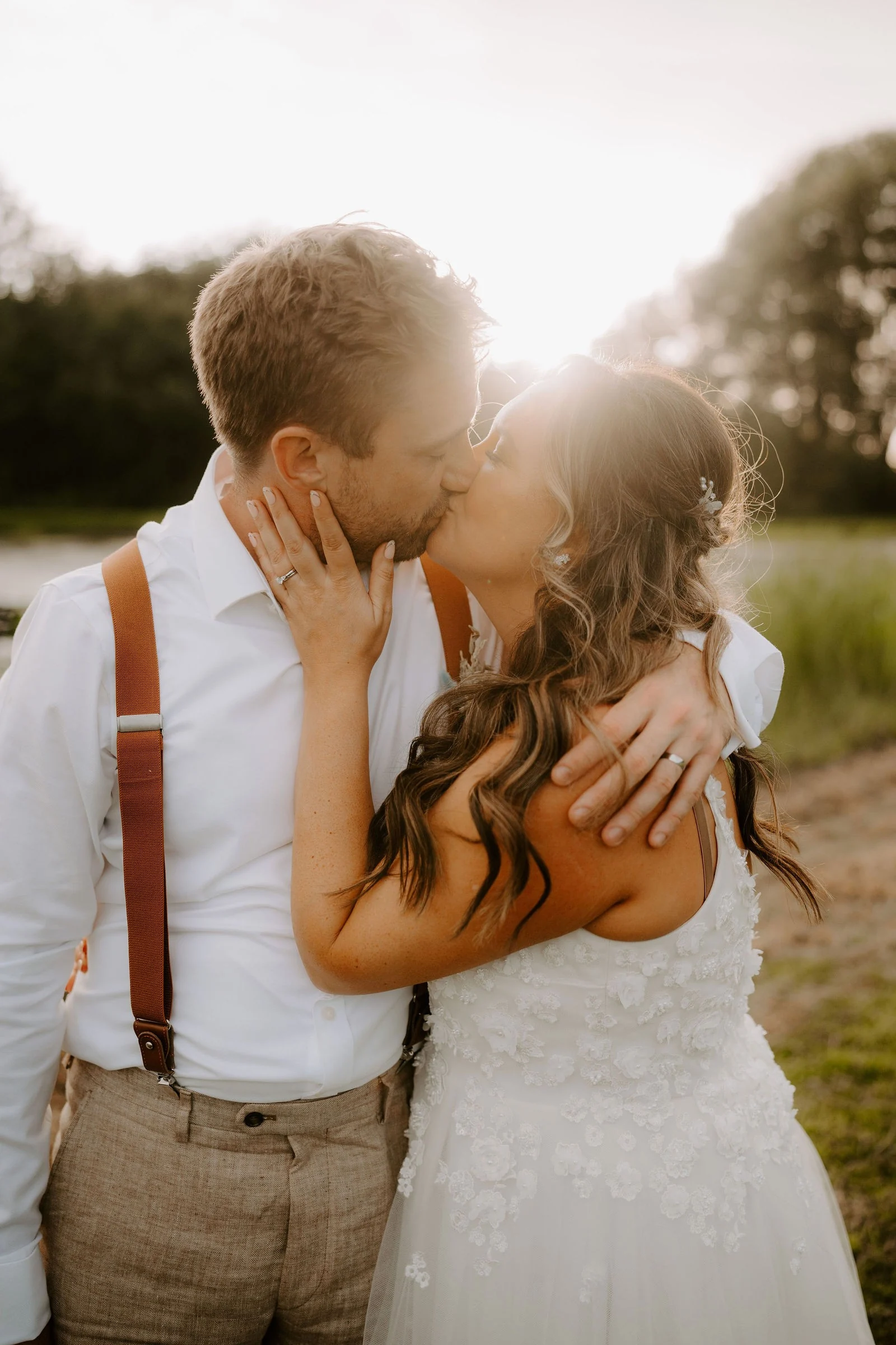 Rebecca and Sam sharing a moment in golden evening light at Duddon Mill Farm