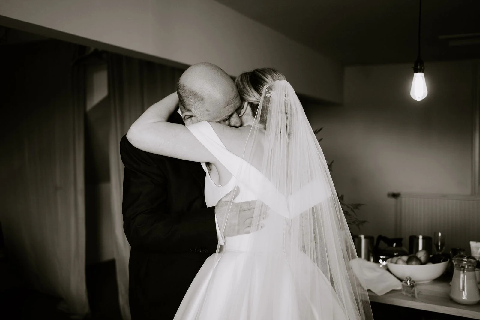 Melissa having her veil adjusted during morning preparations at Larkspur Lodge