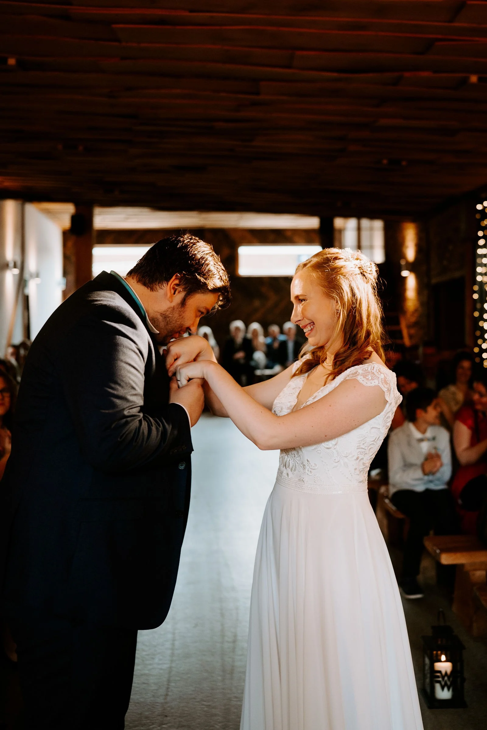 Rebecca and Jack sharing their first dance in the wooden barn at Owen House Wedding Barn