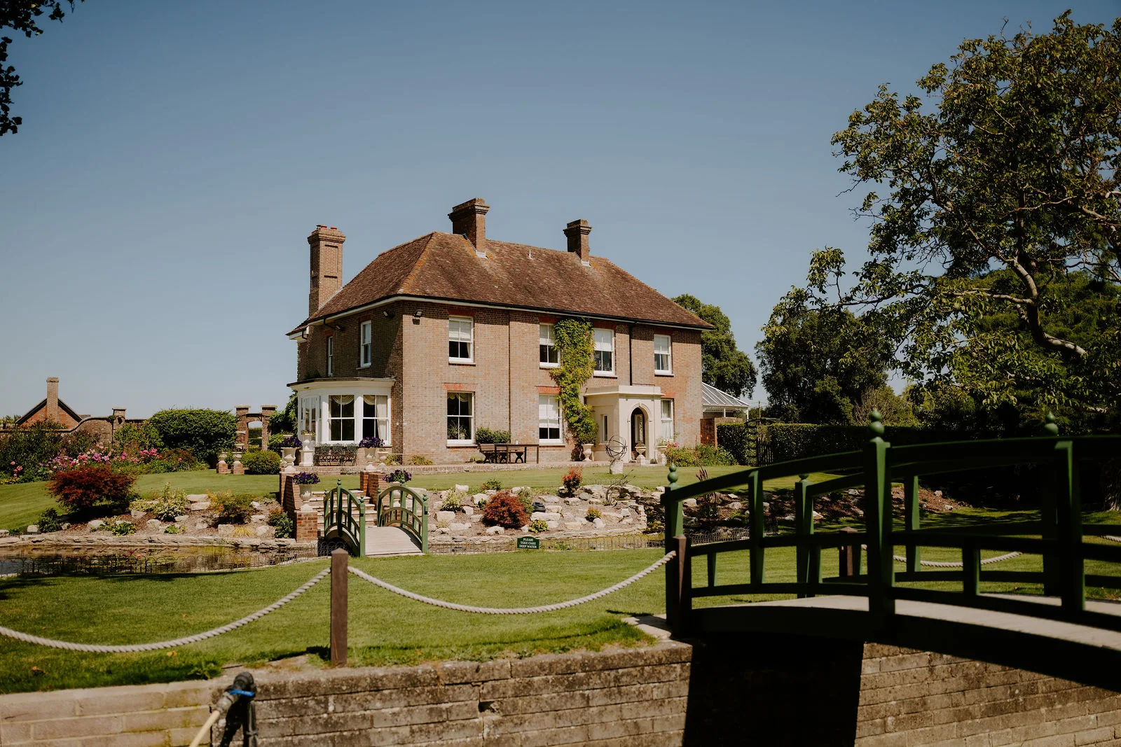 Parley Manor house and gardens in summer
