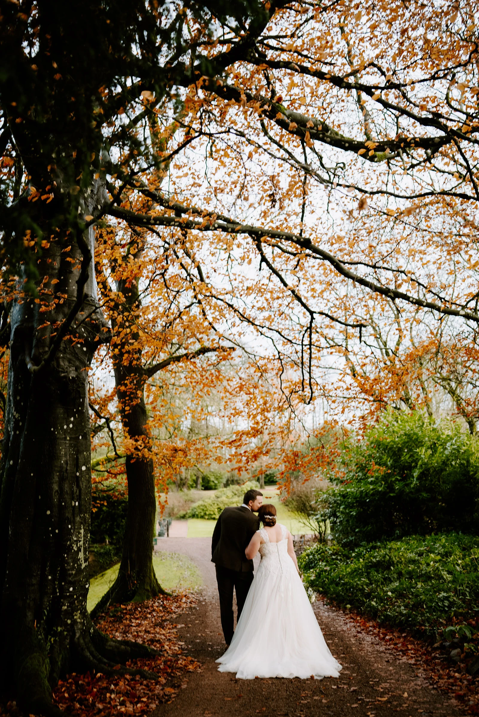 Zoe and Cory romantic wedding portrait on the stone terraces of Clearwell Castle