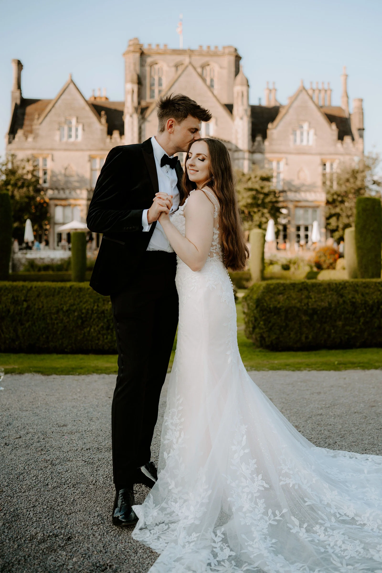 Golden evening light couple portrait at De Vere Tortworth Court