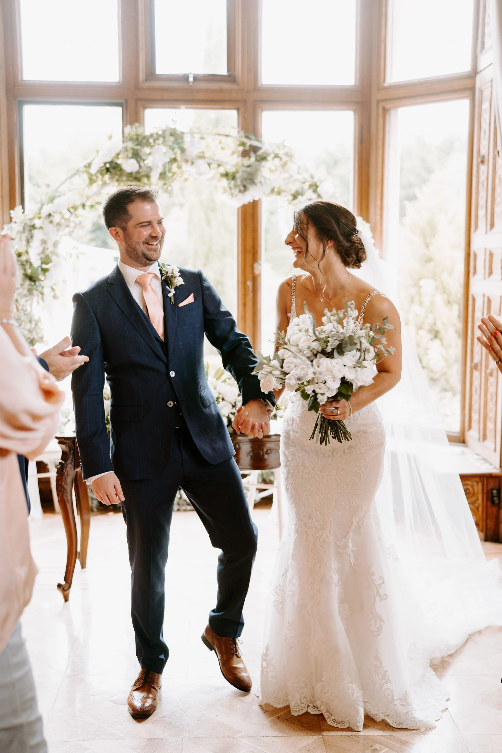 Ceremony vow exchange inside the historic ballroom at Manor by the Lake