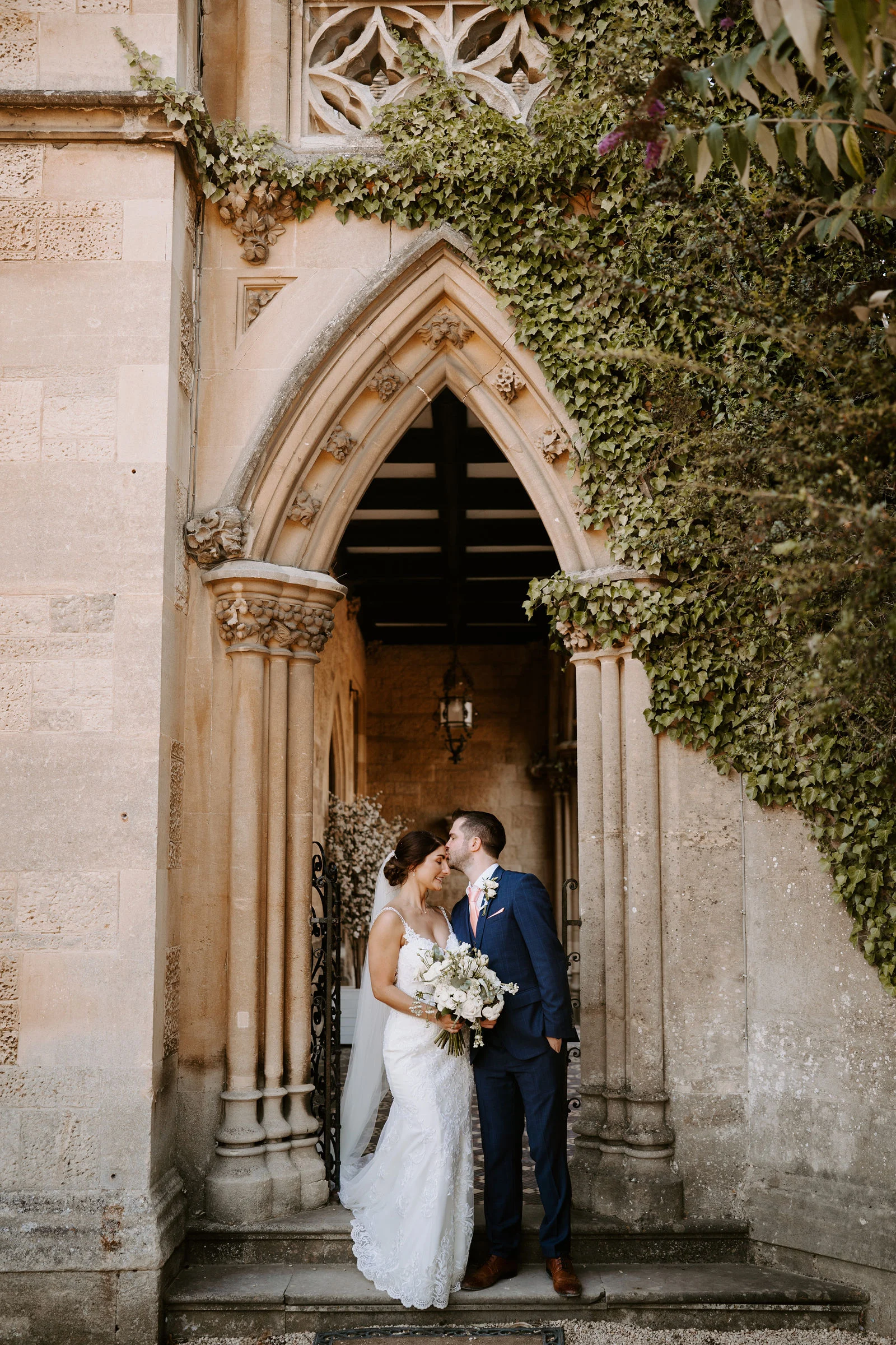 Romantic couple portrait beside the lake at Manor by the Lake