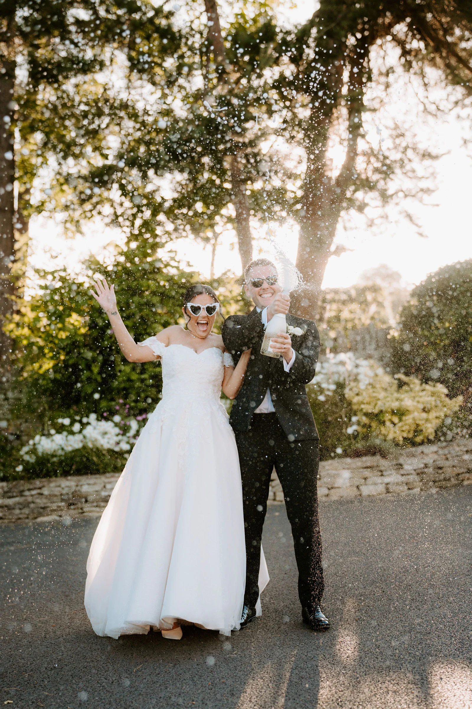 Golden evening light couple portrait at The Kingscote Barn