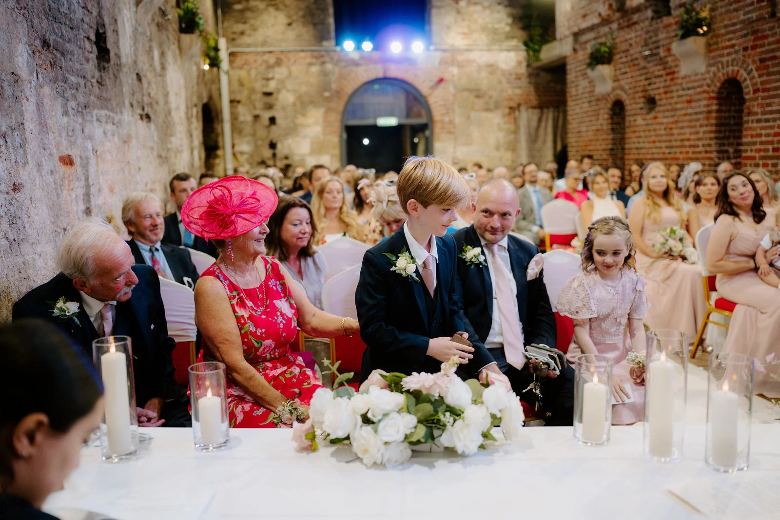 Claire and James with their guests inside the stone-walled Square Tower in Portsmouth