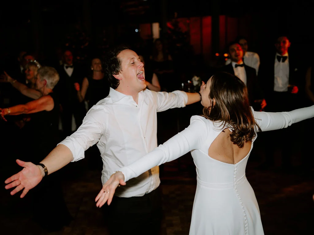 Guests filling the dance floor at Jo and Sam’s wedding.