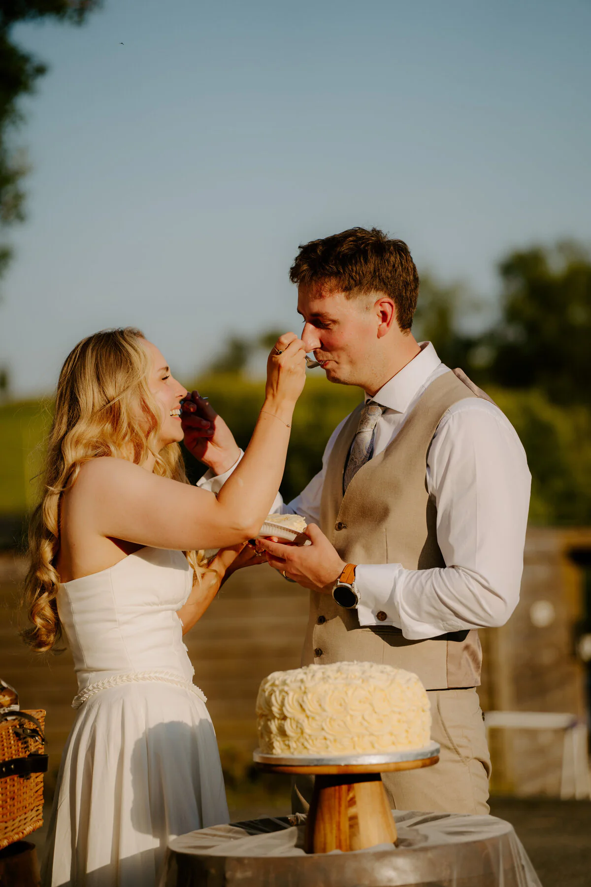 Newlyweds walking together in warm evening light