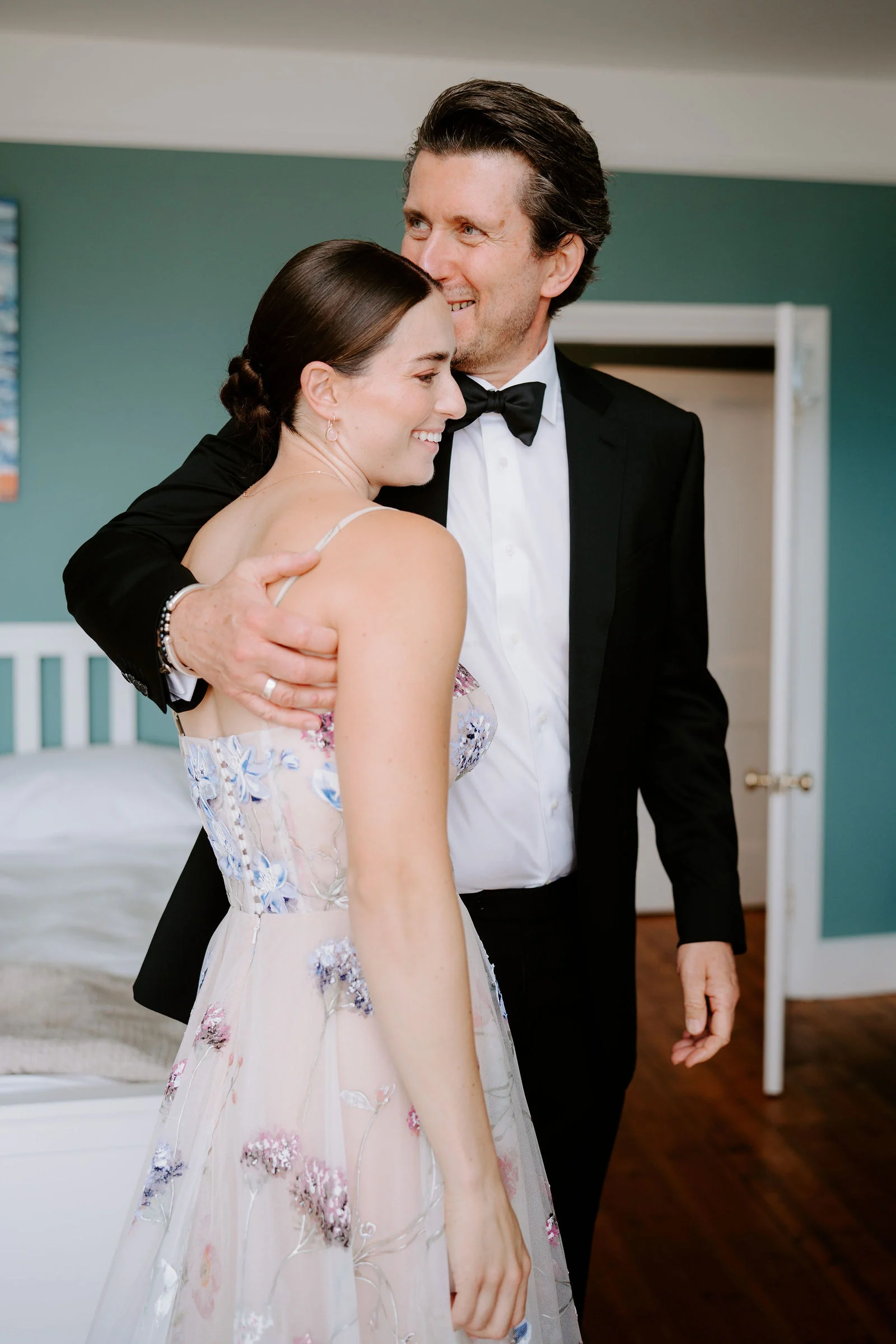 George and Eden sharing a quiet, candid moment beneath the ancient trees at Le Manoir aux Quat'Saisons