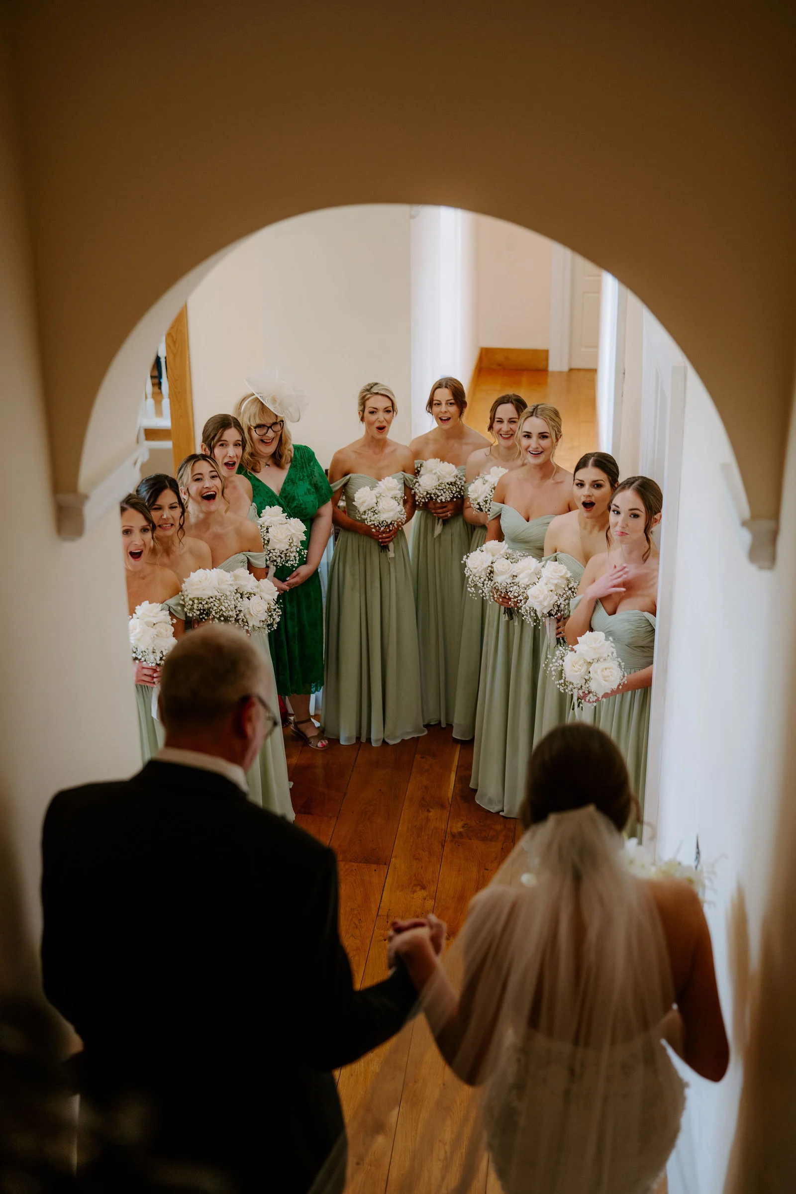 Charlie and Peter exchanging vows inside the medieval stone Monks' Refectory at Notley Abbey