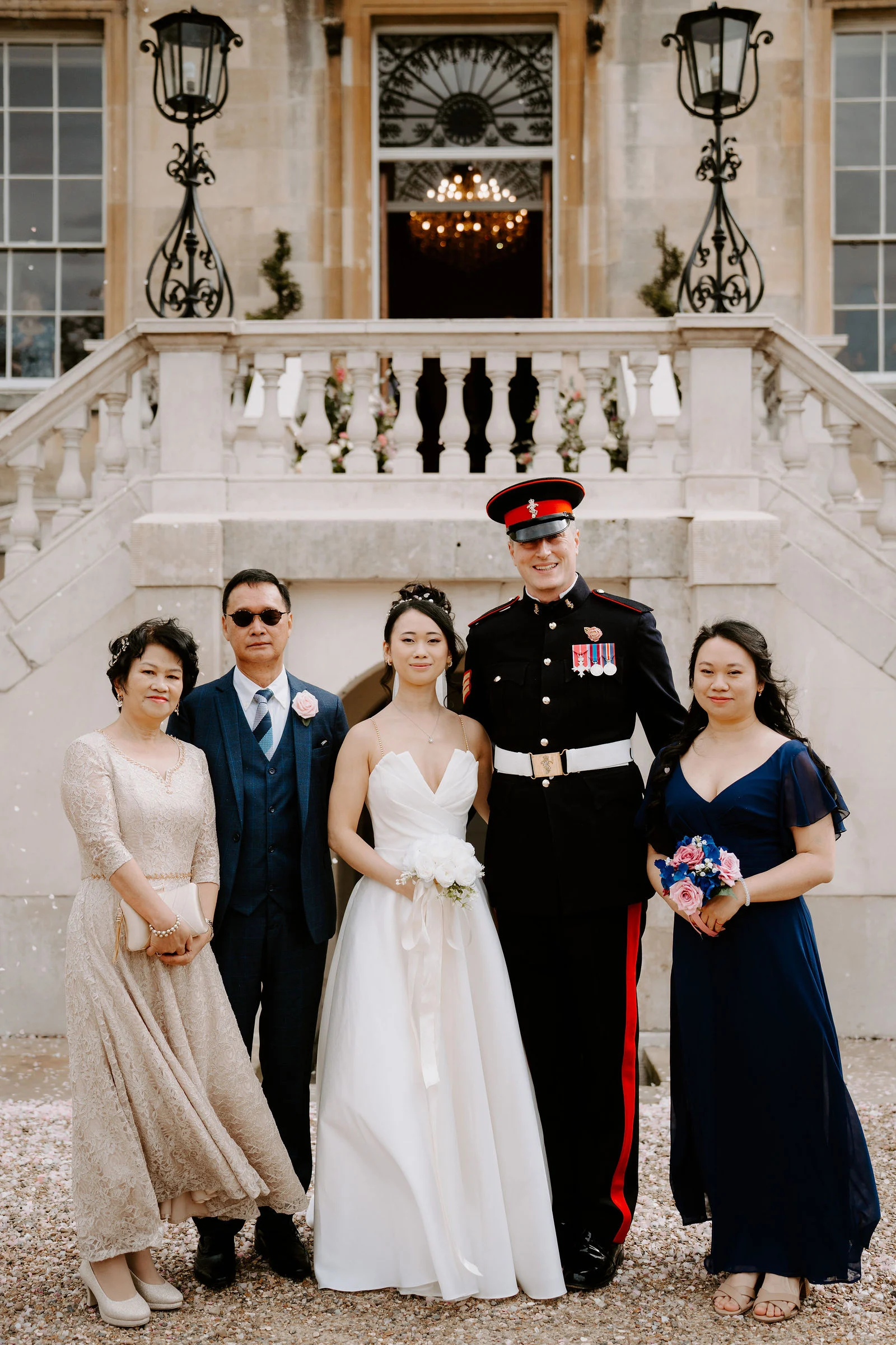Civil ceremony taking place inside the glasshouse atrium conservatory at Botleys Mansion flooded with daylight
