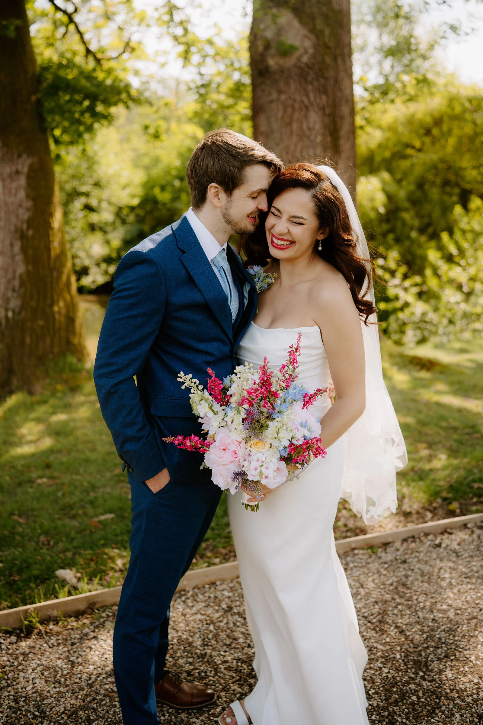 Outdoor civil ceremony at the lake gazebo at Lythe Hill Hotel and Spa surrounded by Surrey Hills woodland
