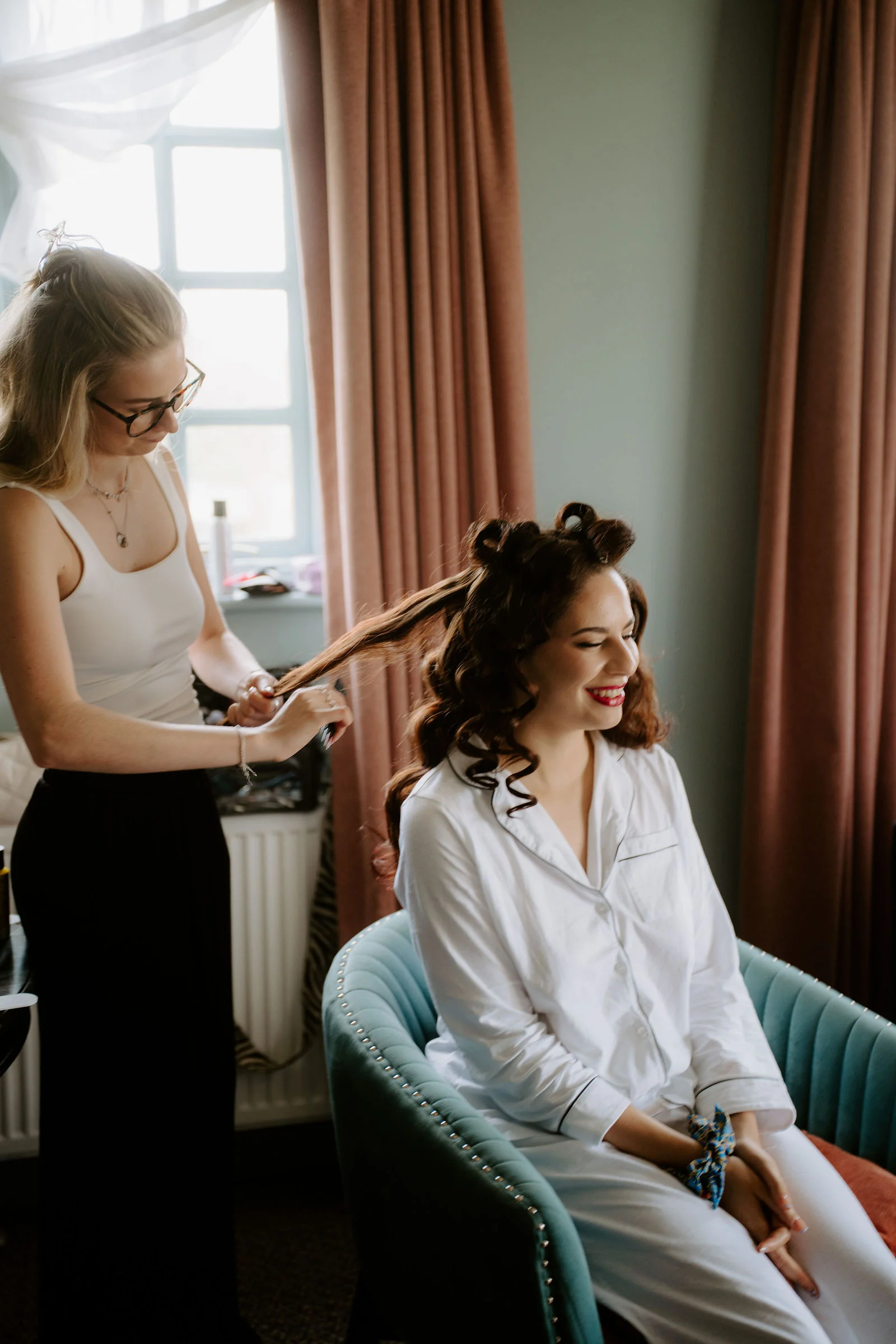 Ana smiling in her bridal gown during morning preparations at Lythe Hill Hotel and Spa in Haslemere, Surrey