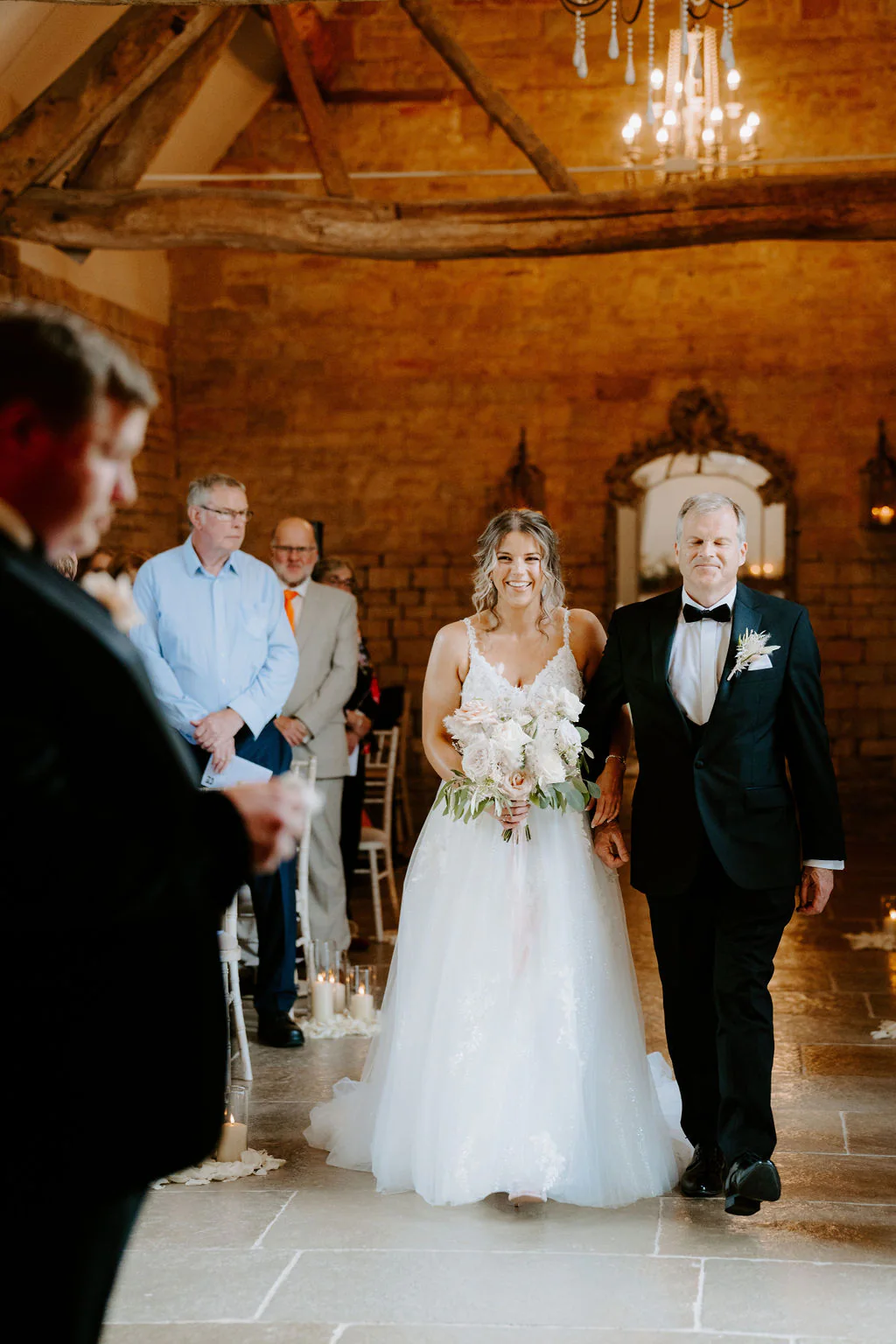 Caitlin & Tom romantic couple portrait outside the 16th-century Thatch Barn at Blackwell Grange