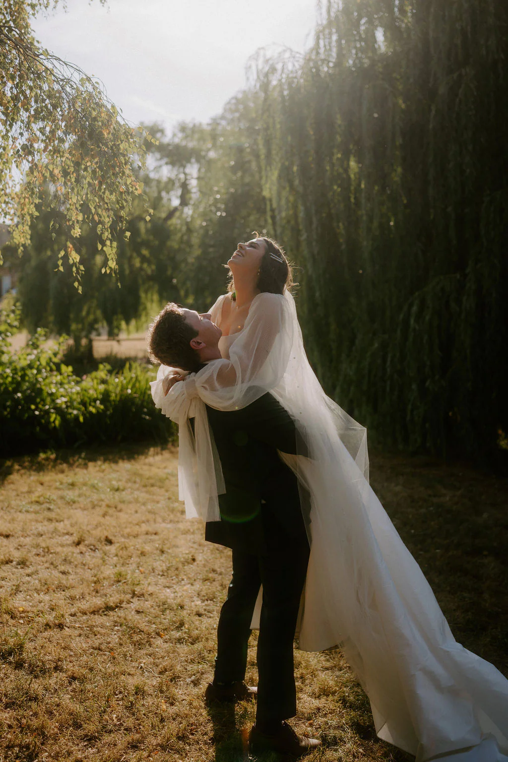 Taylor & Brodie romantic wedding couple portrait under the trees at Talton House in Stratford-upon-Avon