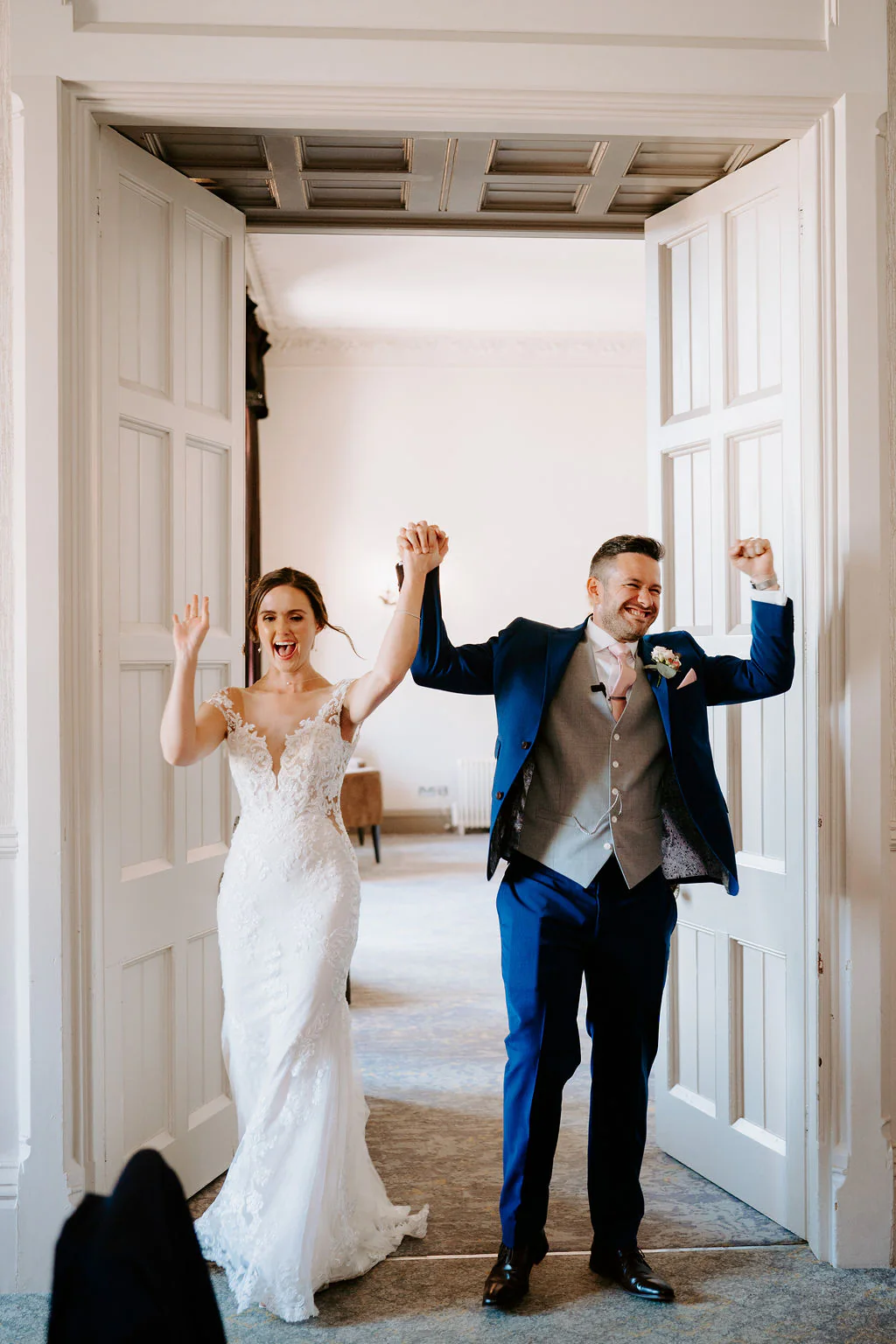 Kate & Josh confetti walk along the grand terrace at Walton Hall in Wellesbourne