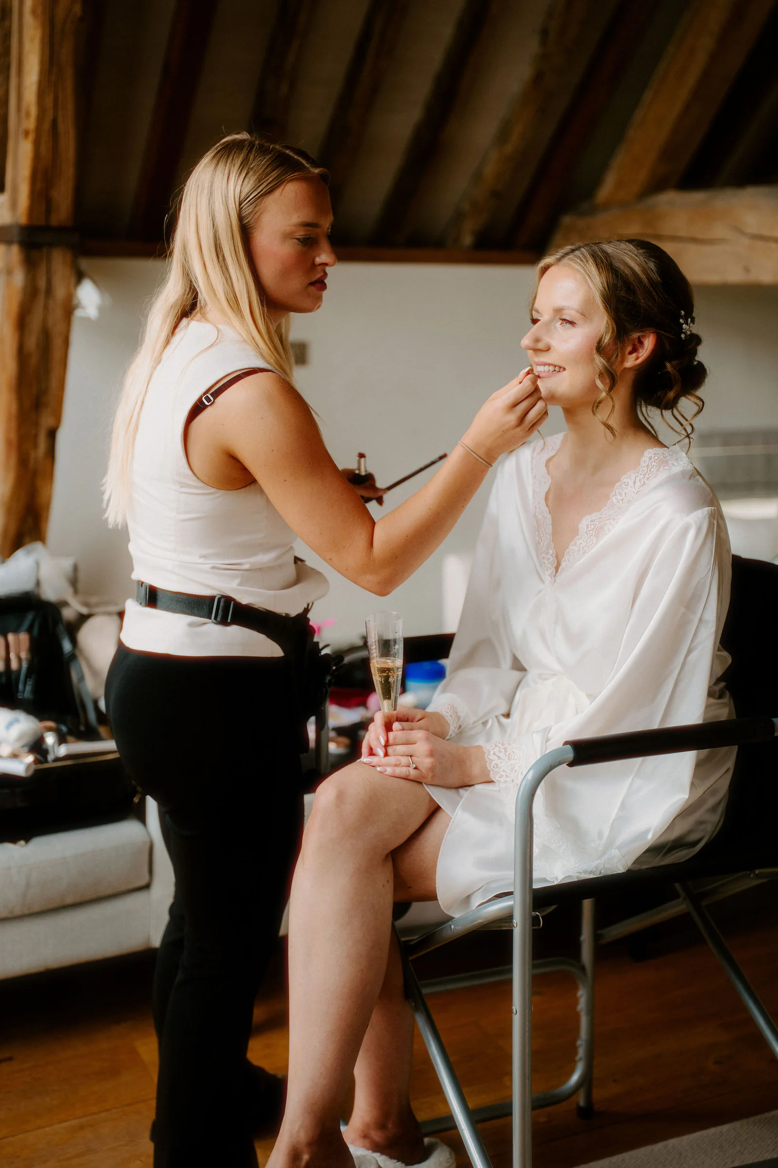 Vanessa bridal portrait illuminated by soft natural light inside Bowerchalke Barn