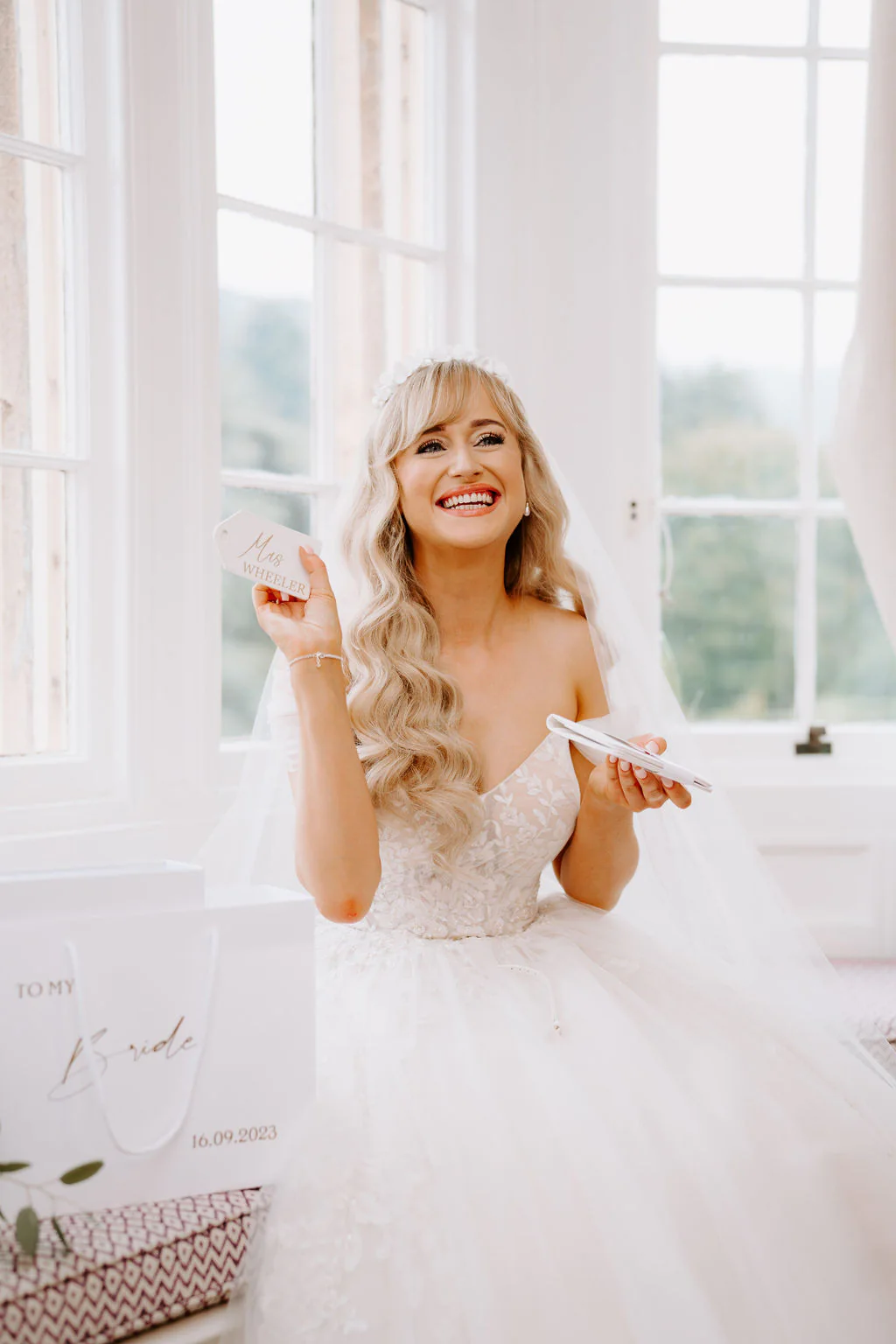 Lucy & Christian emotional ceremony vows inside the grand oak-panelled hall at Dumbleton Hall